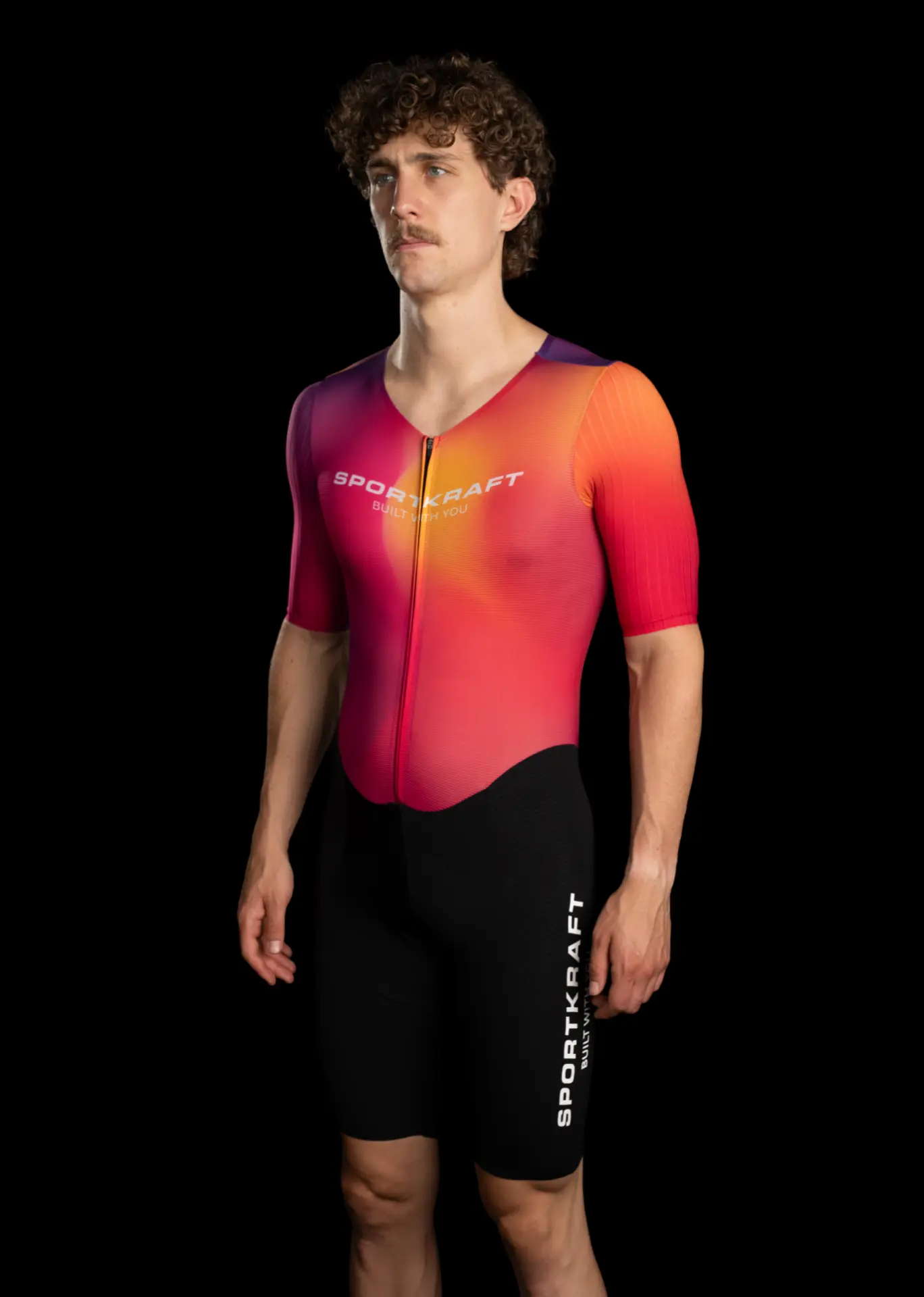 Rider wearing a fitted Sportkraft jersey and bib shorts