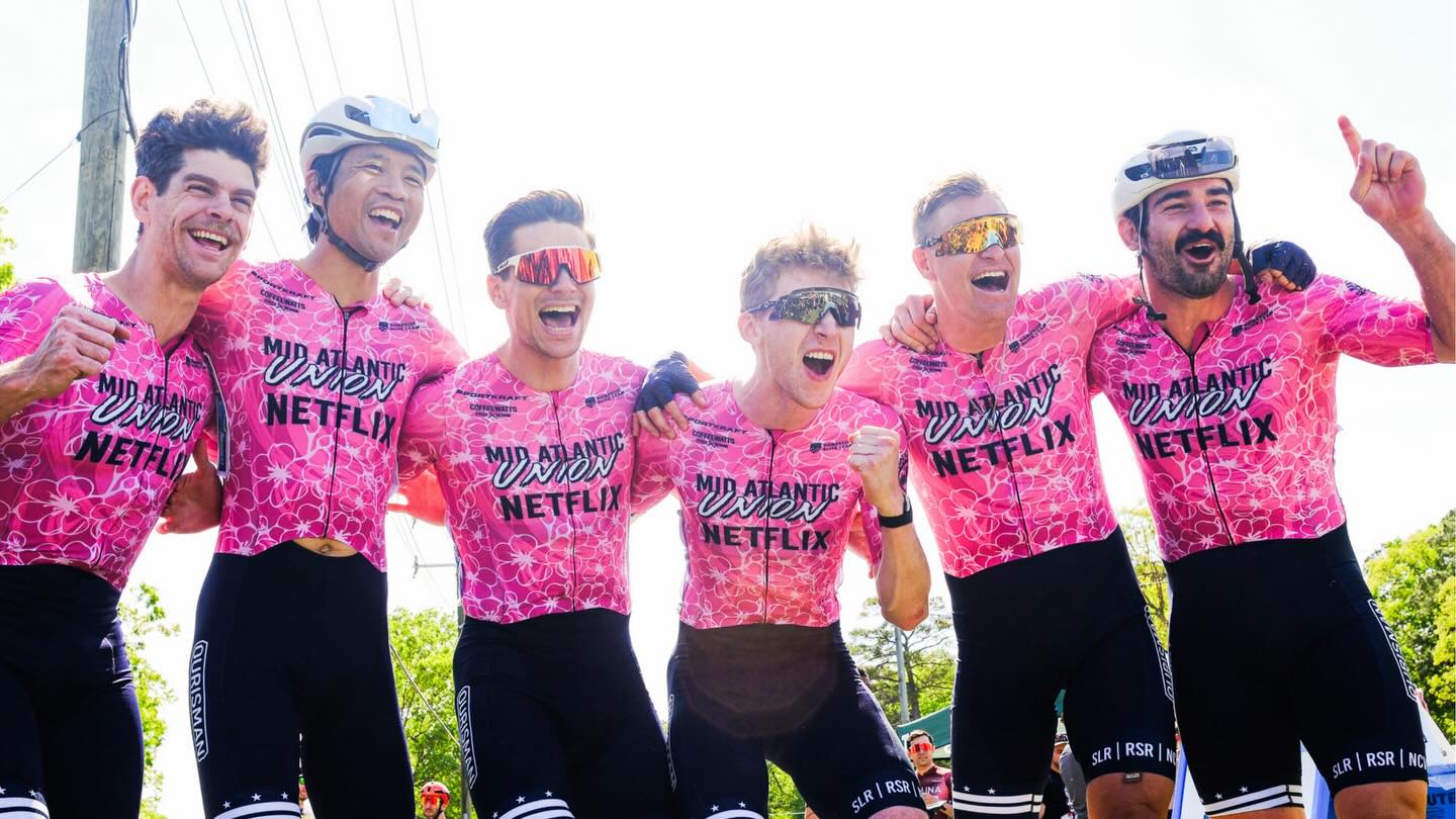 Team celebrating in custom Sportkraft race kit