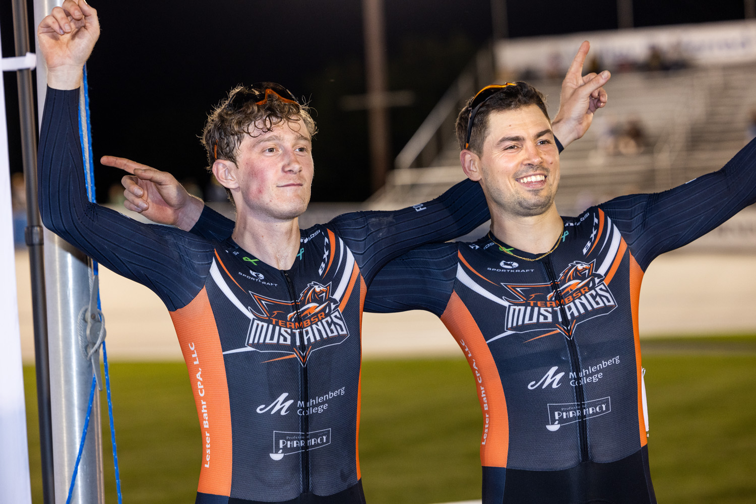 Team BSR Mustangs riders celebrating on the velodrome in custom Sportkraft skinsuits